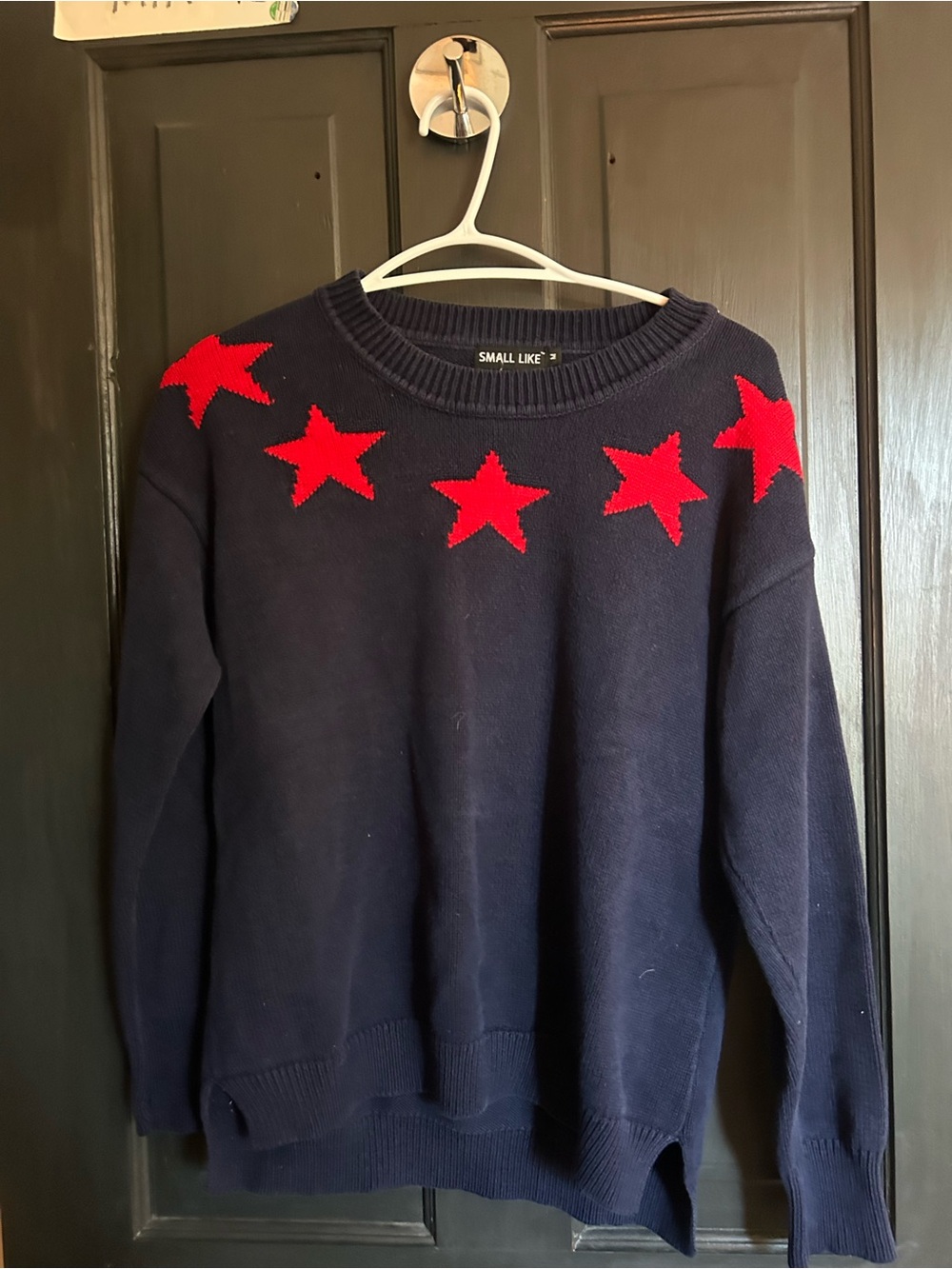 Navy Sweater with Red Star Accents